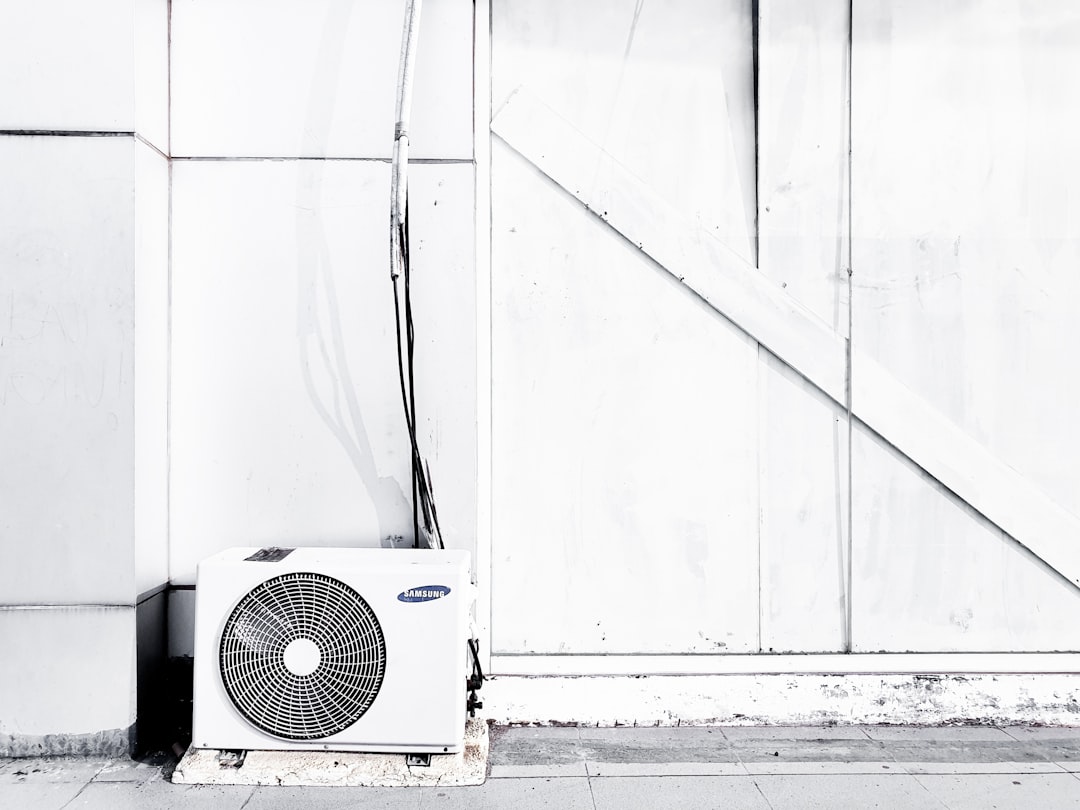 Outdoor compressor unit installed on a level pad with proper clearance - ductless mini split benefits for iowa homeowners Outdoor compressor unit installed on a level pad with proper clearance - ductless mini split benefits for iowa homeowners
