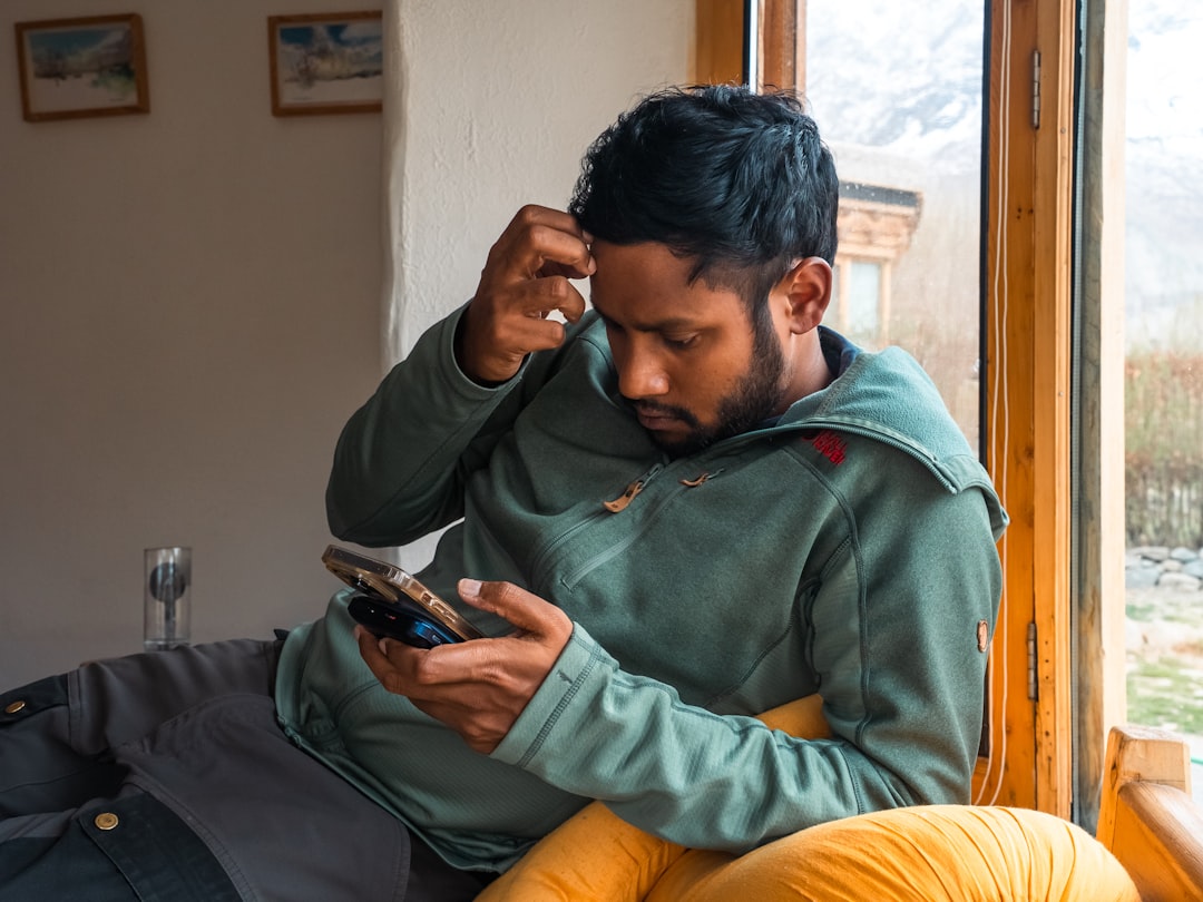 person looking up repair services on phone - emergency repair near me des moines person looking up repair services on phone - emergency repair near me des moines