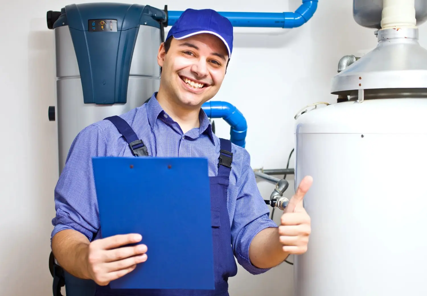 energy-efficient heat pump water heater in a clean basement utility room energy-efficient heat pump water heater in a clean basement utility room