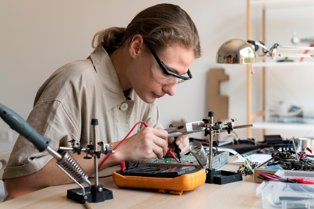 technician using a multi-meter to test electrical components - what does a professional ac tune up include technician using a multi-meter to test electrical components - what does a professional ac tune up include