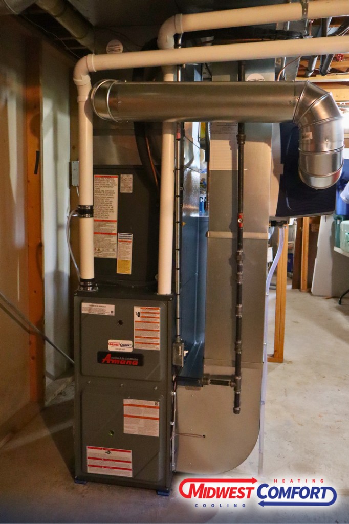 Midwest Comfort technician completing a new furnace installation